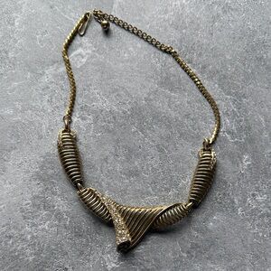 Elegant Gold tone bib Necklace scroll with Crystal Accents